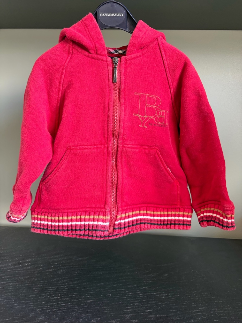 Burberry Zip-Up Hoodie, Elastic bottom and cuffs.